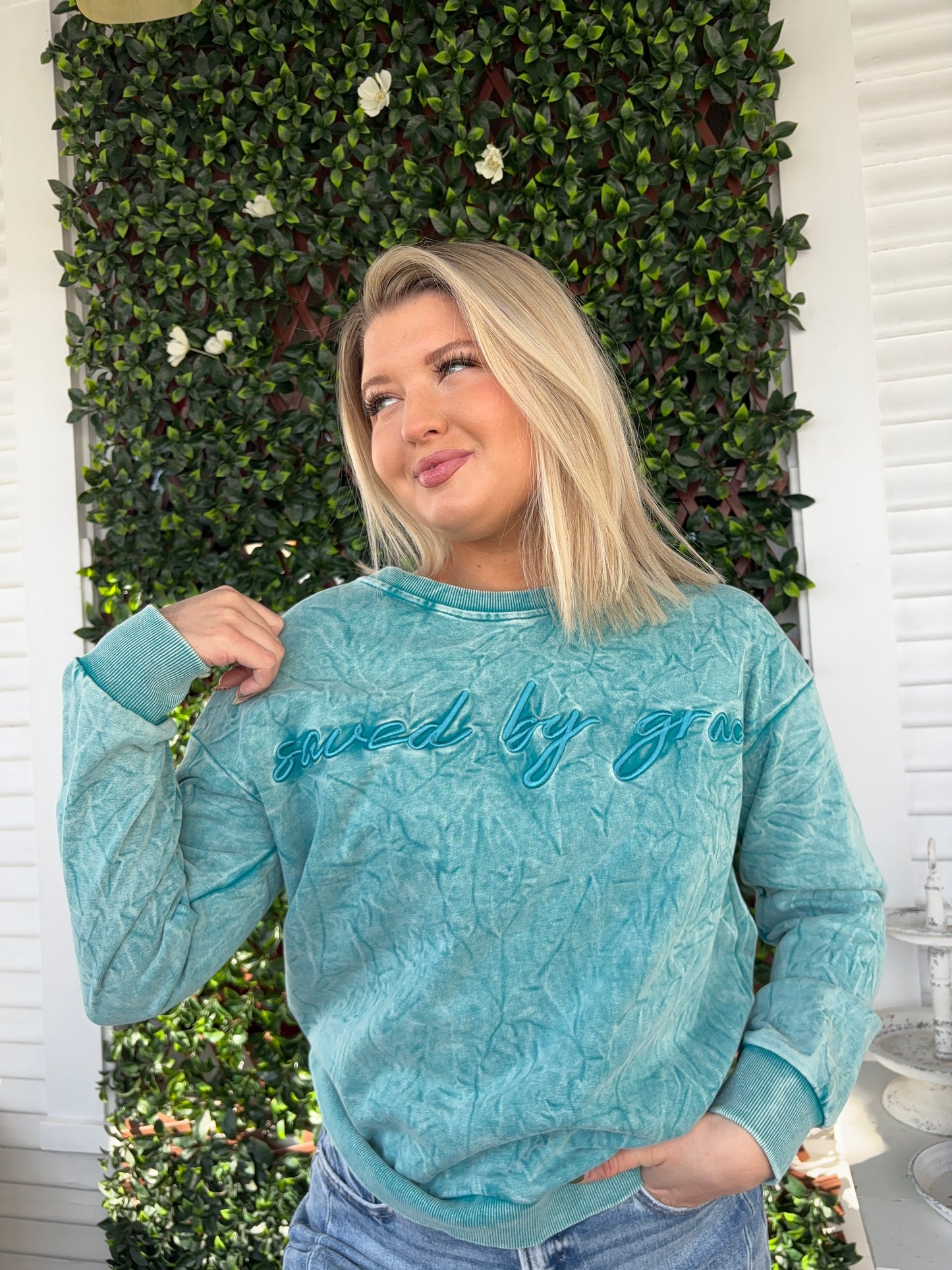 Embroidered ‘saved by grace’ Crewneck