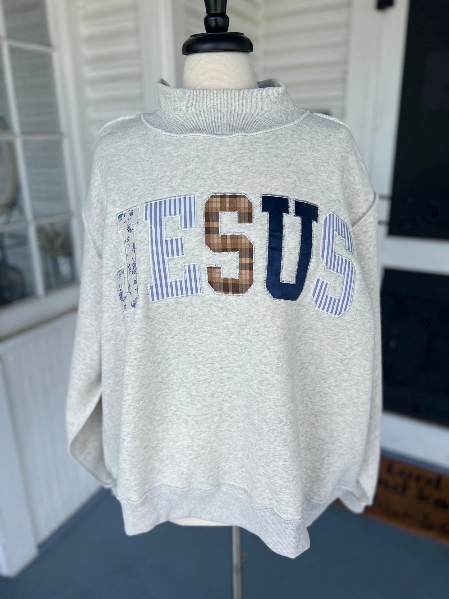 ‘JESUS’ Embroidered Patchwork Mock Neck