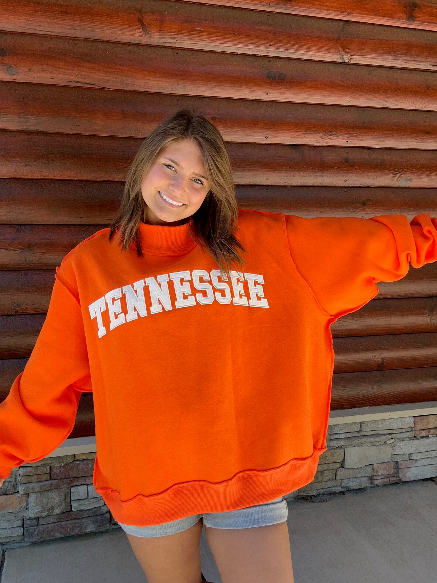 Embroidered TN Mock Neck Sweatshirt